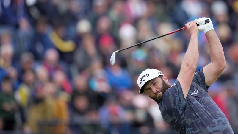 Spain's Jon Rahm plays his tee shot on the 4th hole during the third day of the British Open...
