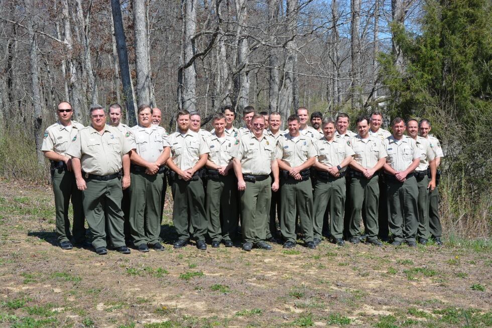 Fentress County Officer Doug Lamb takes photo with fellow officers.