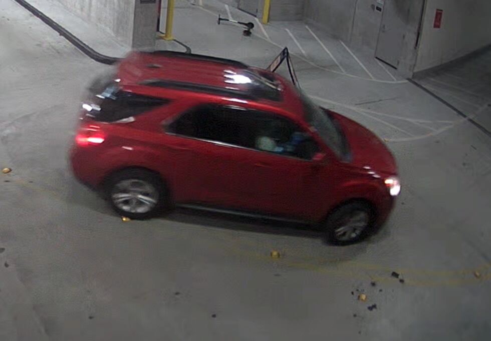 Police believe the shooters drove away in this red Chevrolet Equinox, based on surveillance...