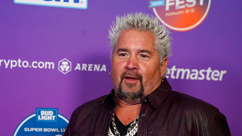 Chef Guy Fieri arrives on day three of the Bud Light Super Bowl Music Fest, Saturday, Feb. 12,...