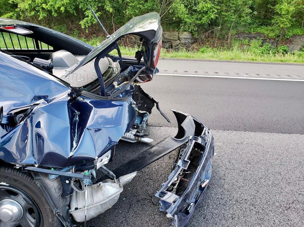 Significant damage was sustained to officer Miller's car after the incident.