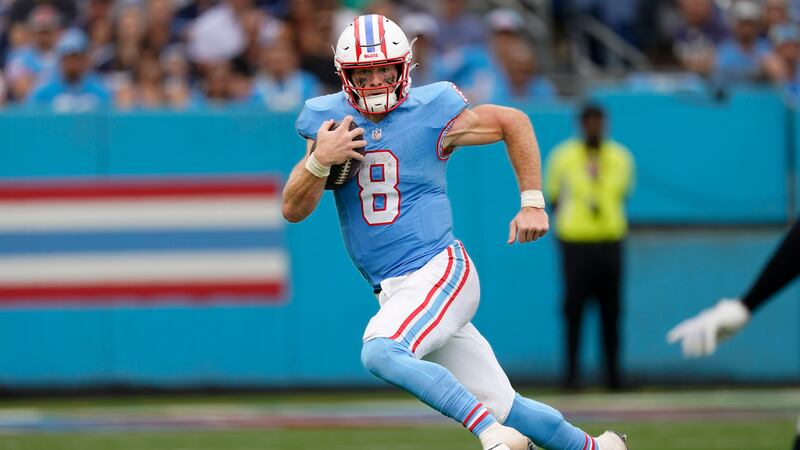 Tennessee Titans quarterback Will Levis (8) runs the ball against the Atlanta Falcons during...
