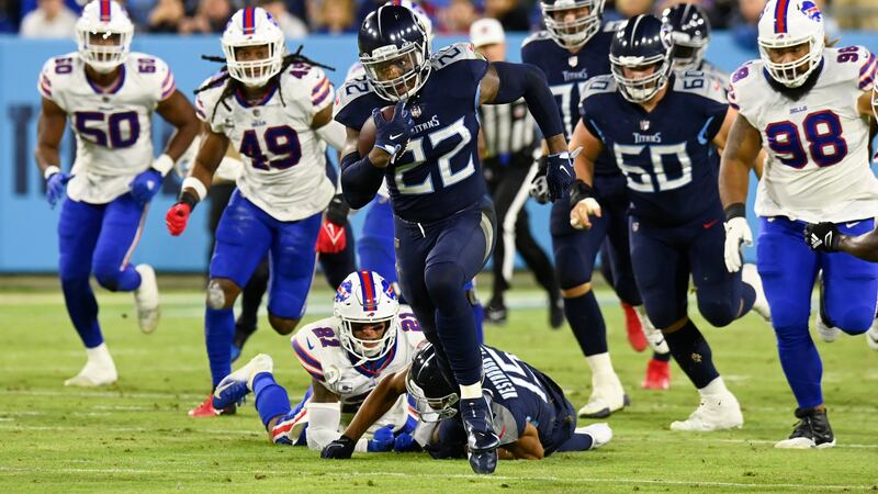 FILE - Tennessee Titans running back Derrick Henry (22) runs 76 yards for a touchdown against...